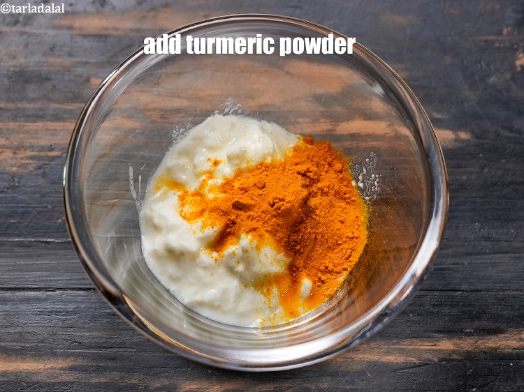 Step 8 – Add &frac12; tsp <a href="https://www.tarladalal.com/glossary-turmeric-powder-haldi-645i">turmeric powder (haldi)</a>.