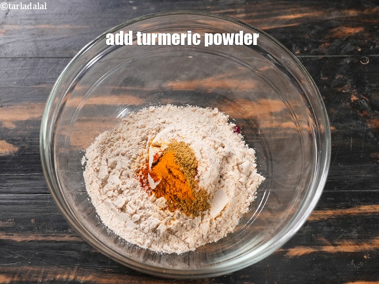 Step 8 – Add 1/4 tsp&nbsp;<a href="https://www.tarladalal.com/glossary-turmeric-powder-haldi-645i">turmeric powder (haldi)</a>.