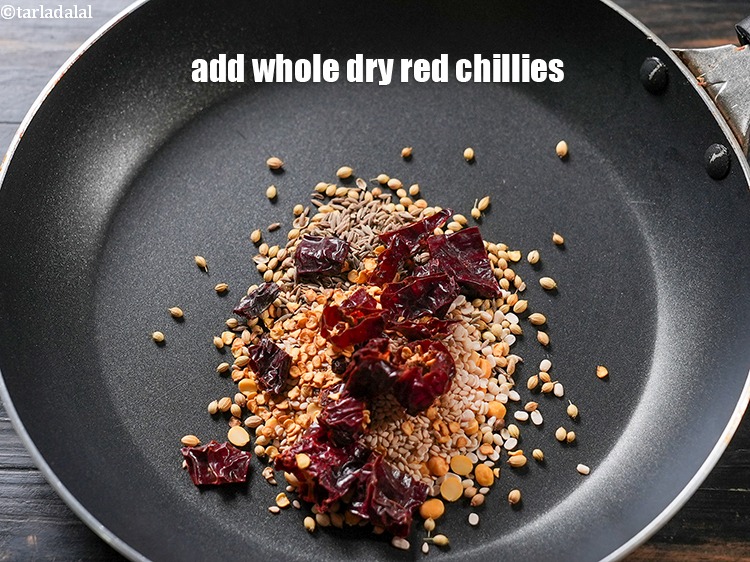 Step 8 – Add 4 whole dry red chillies, broken into pieces.