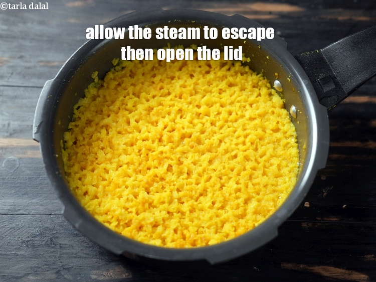 Step 13 – Allow the steam to escape before opening the lid.