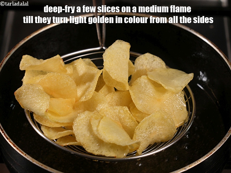 Step 9 – Deep-fry a few slices on a medium flame till they turn light golden in colour …