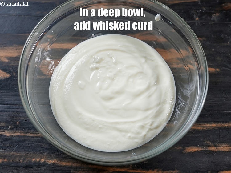 Step 10 – To make <strong>pudina boondi raita</strong>, in a deep bowl, add 2 cup whisked curd.