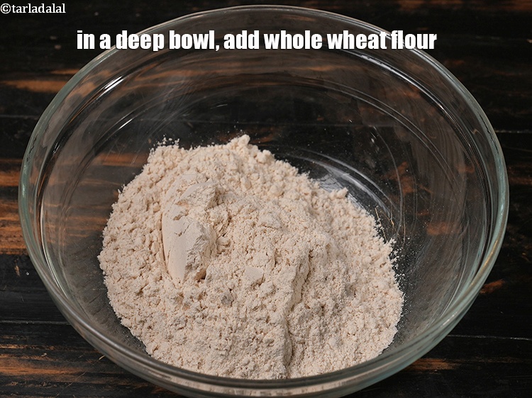 Step 8 – In a deep bowl, add 1 cup <a href="https://www.tarladalal.com/glossary-whole-wheat-flour-gehun-ka-atta-gehun-ka-aata-429i">whole wheat flour (gehun ka atta)</a>.&nbsp;