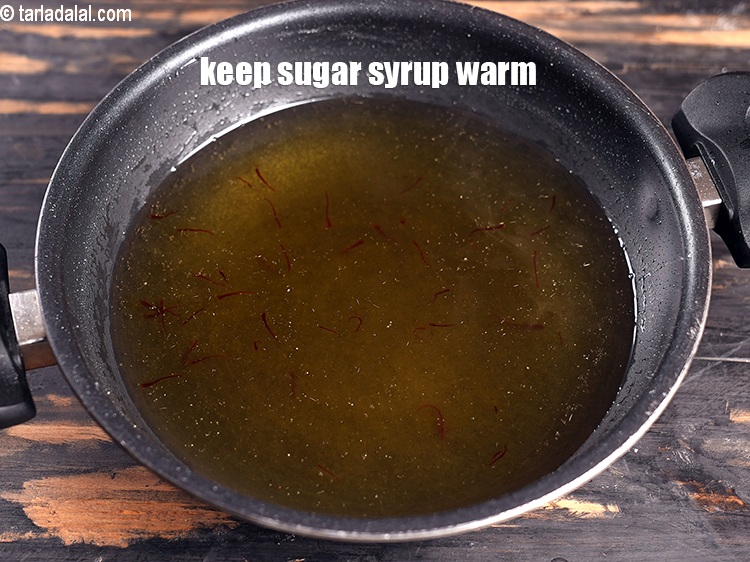 Step 9 – Once ready. Keep the sugar syrup warm.