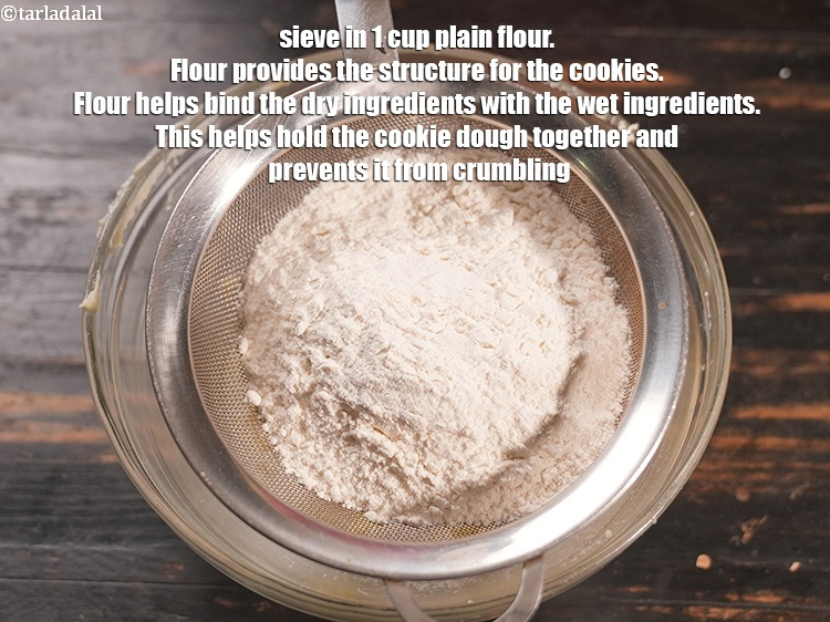 Step 8 – Sieve in 1 cup <a href="https://www.tarladalal.com/glossary-plain-flour-maida-188i">plain flour (maida)</a>. Flour provides the structure for the cookies. …