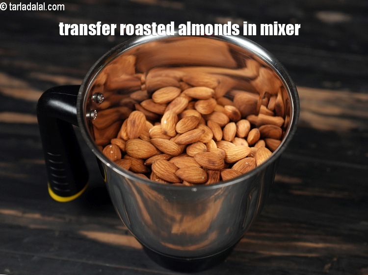 Step 8 – <p>Transfer the remaining roasted almonds in a big mixer.</p>