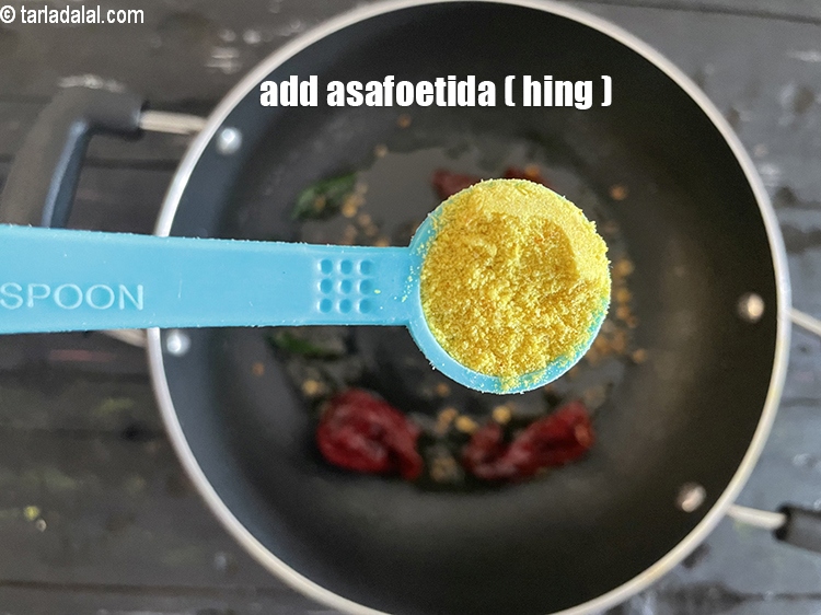 Step 20 – Add&nbsp;<meta charset="UTF-8" />1/2 tsp&nbsp;<a href="glossary-asafoetida-hing-113i">asafoetida (hing)</a>.