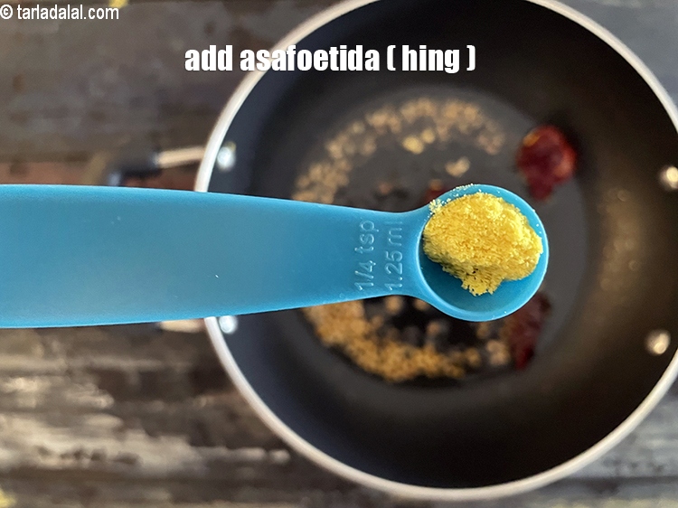 Step 19 – Add&nbsp;<meta charset="UTF-8" />1/2 tsp&nbsp;<a href="glossary-asafoetida-hing-113i">asafoetida (hing)</a>.