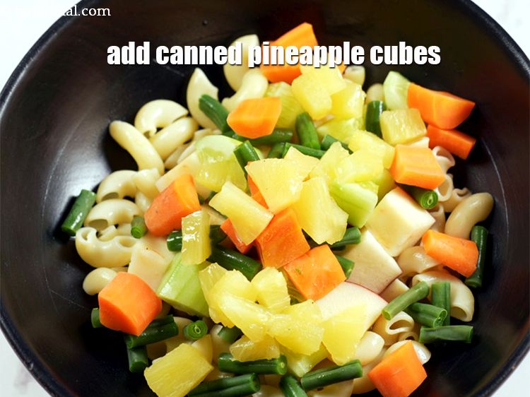 Step 8 – Add 1/4 cup canned pineapple cubes.