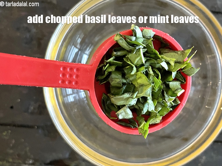 Step 9 – Add&nbsp;<meta charset="UTF-8" />1 tbsp&nbsp;<a href="glossary-chopped-basil-804i">chopped basil leaves</a>.