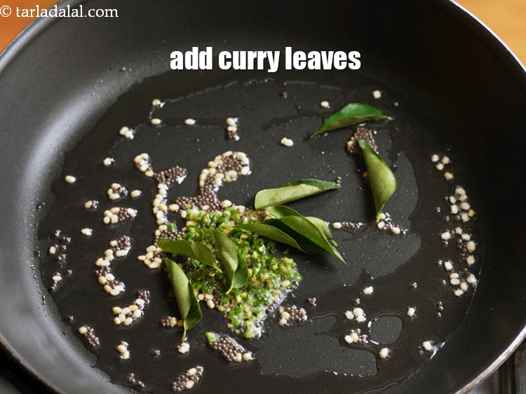 Step 9 – Add 7 to 8 <a href="https://www.tarladalal.com/glossary-curry-leaves-kadi-patta-kadipatta-388i">curry leaves (kadi patta)</a>.