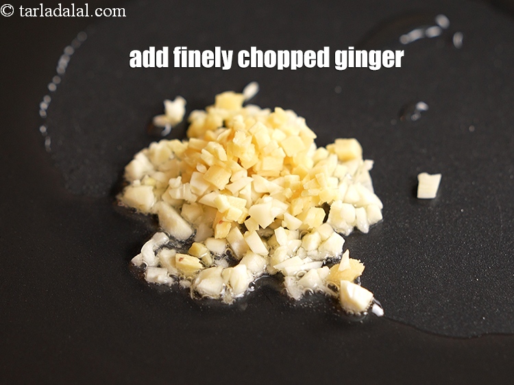 Step 8 – Add 2 tsp finely <a href="https://www.tarladalal.com/glossary-chopped-ginger-786i">chopped ginger (adrak)</a>.
