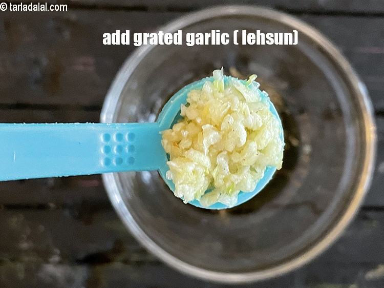 Step 12 – Add&nbsp;<meta charset="UTF-8" />1/2 tsp&nbsp;<a href="glossary-grated-garlic-859i">grated garlic (lehsun)</a>.