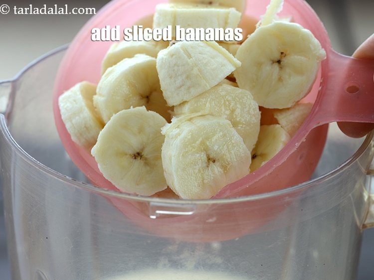Step 8 – Add 1 cup&nbsp;sliced&nbsp;<a href="https://www.tarladalal.com/glossary-banana-kela-17i">bananas</a>. Banana is added for the thickness of the smoothie.