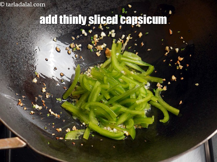 Step 8 – Add &frac12; cup thinly <a href="https://www.tarladalal.com/glossary-sliced-capsicum-165i">sliced capsicum</a>.
