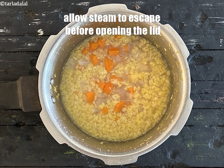 Step 28 – Allow the steam to escape before opening the lid.