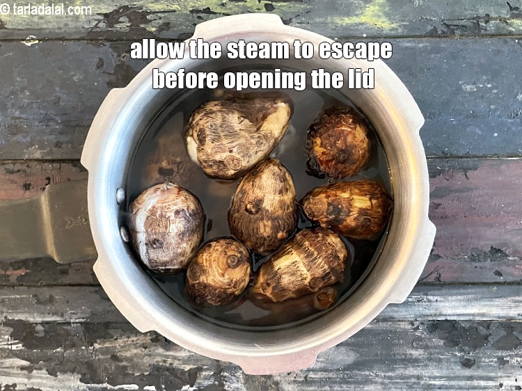 Step 9 – <meta charset="UTF-8" />Allow the steam to escape before opening the lid.&nbsp;Arbi after cooking.&nbsp;