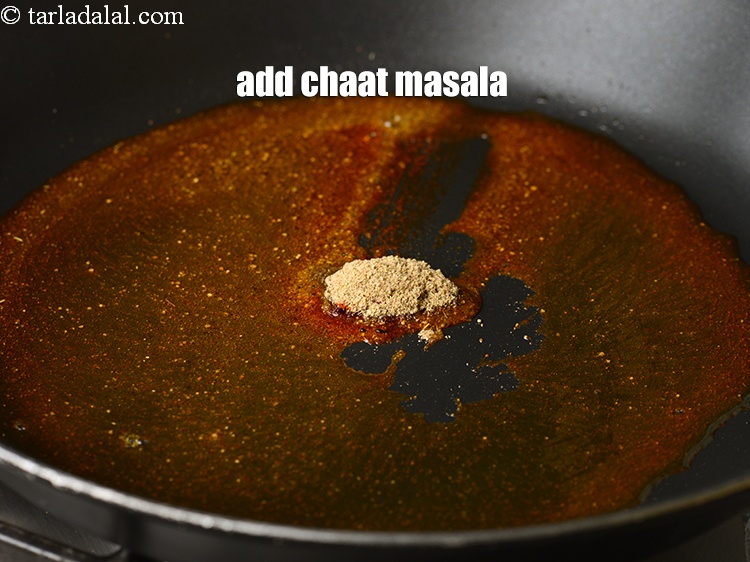 Step 9 – Add &frac12; tsp <a href="https://www.tarladalal.com/glossary-chaat-masala-300i">chaat masala</a>.
