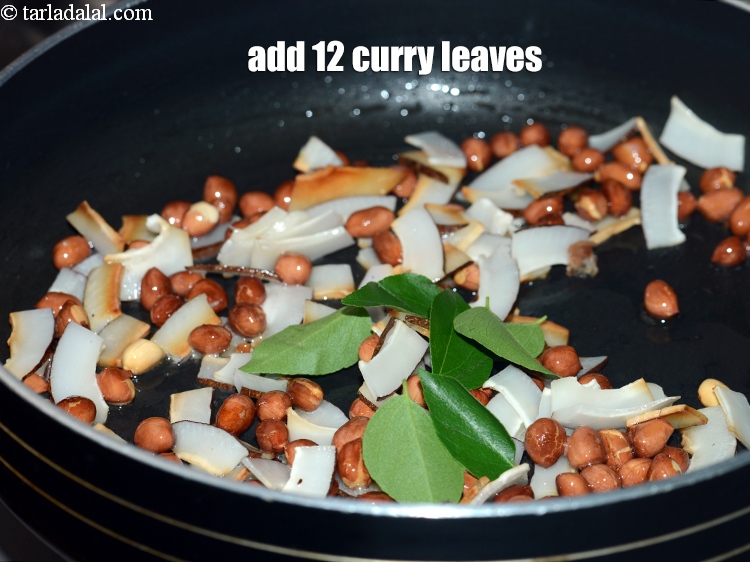 Step 8 – Add 12 <a href="https://www.tarladalal.com/glossary-curry-leaves-kadi-patta-kadipatta-388i">curry leaves (kadi patta)</a>.
