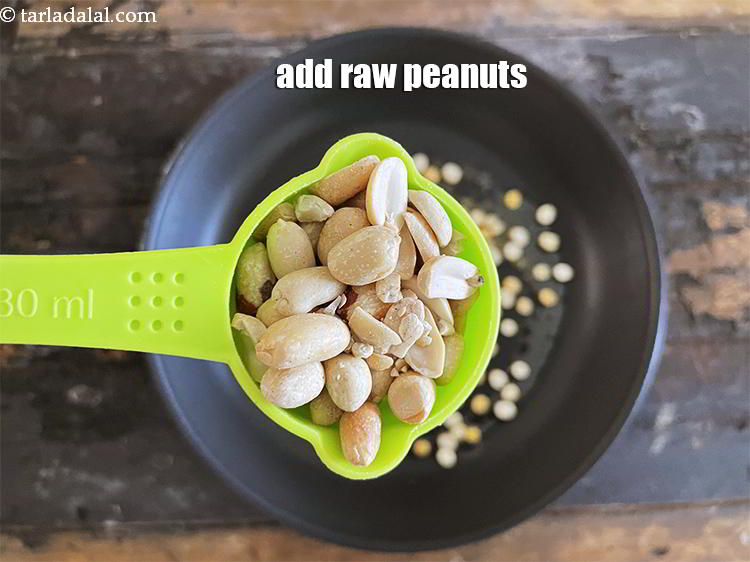 Step 14 – Add&nbsp;<meta charset="UTF-8" />1/4 cup&nbsp;<a href="glossary-raw-peanuts-kachi-mungfali-kachi-moongfali-847i">raw peanuts</a>. You can use shelled or unshelled raw peanuts.