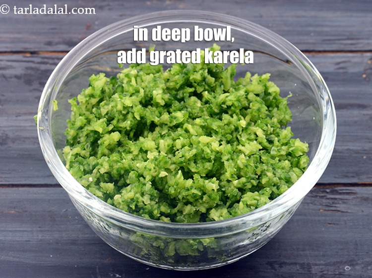 Step 8 – In a deep bowl, add grated karela.