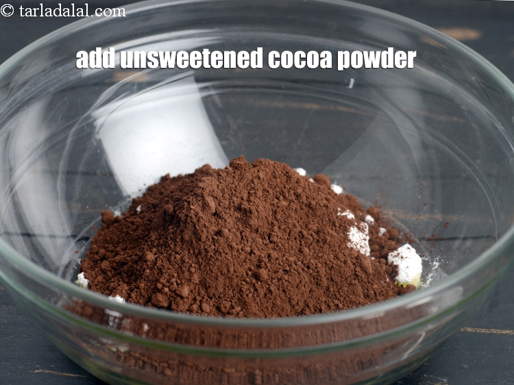 Step 8 – Add &frac14; cup <a href="https://www.tarladalal.com/glossary-unsweetened-cocoa-powder-2776i">unsweetened cocoa powder</a>.