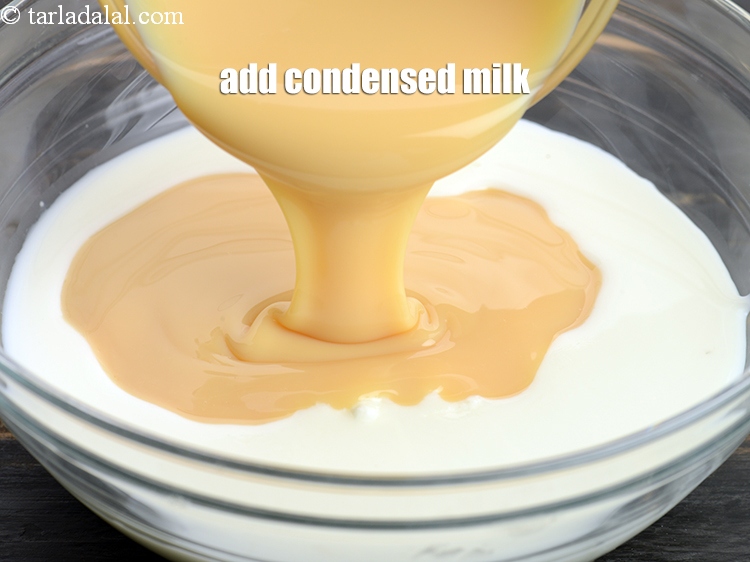 Step 8 – Add 1 cup <a href="https://www.tarladalal.com/glossary-condensed-milk-672i">condensed milk</a>&nbsp;(milkmade).