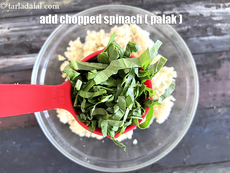 Step 20 – <html><head></head><body><p>Add&nbsp;1/4 cup&nbsp;finely&nbsp;<a href="glossary-chopped-spinach-780i">chopped spinach (palak)</a>.</p></body></html>