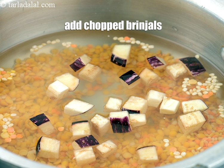 Step 9 – Add &frac14; cup <a href="https://www.tarladalal.com/glossary-chopped-brinjals-129i">chopped brinjals (baingan / eggplant)</a>.&nbsp;