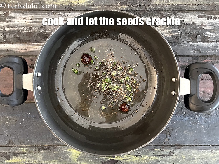 Step 24 – Cook and let the seeds and&nbsp;crackle.