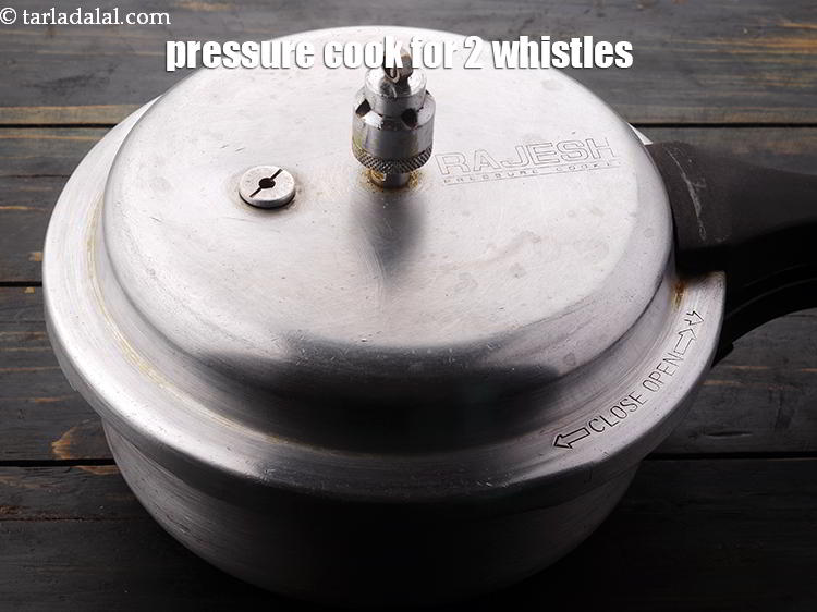 Step 14 – Close the lid and pressure cook for 2 whistles. Allow the steam to escape before …