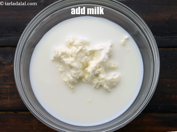 Step 8 – Add 1/4 cup&nbsp;<a href="https://www.tarladalal.com/glossary-milk-doodh-full-cream-milk-514i">milk</a>. Here we have used full fat milk to get the desired …