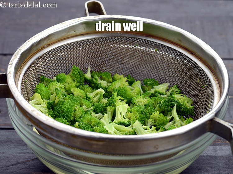 Step 8 – Drain the broccoli using a strainer. Discard the water.