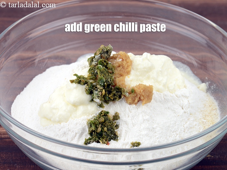 Step 8 – Add &frac12; tsp <a href="https://www.tarladalal.com/glossary-green-chilli-paste-hari-mirch-ki-paste-mirchi-paste-333i">green chilli paste</a>.