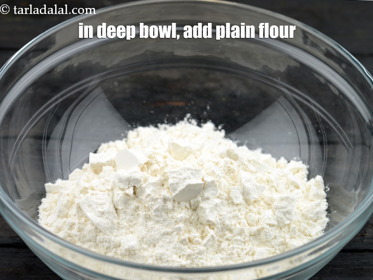 Step 8 – In a deep bowl, add 1 1/4 cups&nbsp;<a href="https://www.tarladalal.com/glossary-plain-flour-maida-188i">plain flour (maida)</a>.
