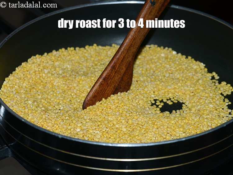 Step 9 – Dry roast the yellow moong dal for 3 to 4 minutes, while stirring continuously.