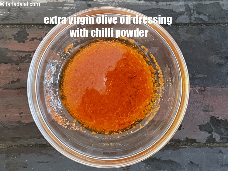 Step 15 – Keep aside. Extra virgin olive oil dressing with chilli powder.