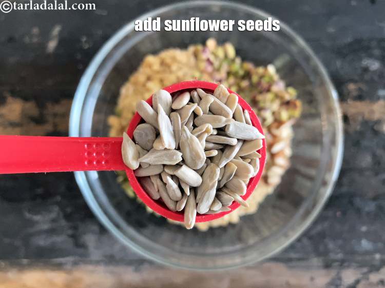 Step 11 – Add 2&nbsp;tbsp&nbsp;<a href="glossary-sunflower-seeds-surajmukhi-ke-beej-611i">sunflower seeds (surajmukhi ke beej)</a>.