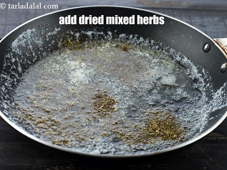 Step 8 – Add 1 tsp&nbsp;<a href="https://www.tarladalal.com/glossary-dried-mixed-herbs-466i">dried mixed herbs</a>.