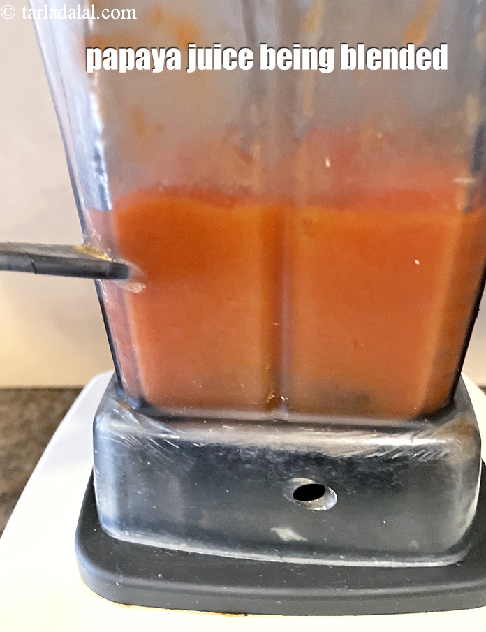 Step 9 – <strong>Papaya juice</strong> being blended.