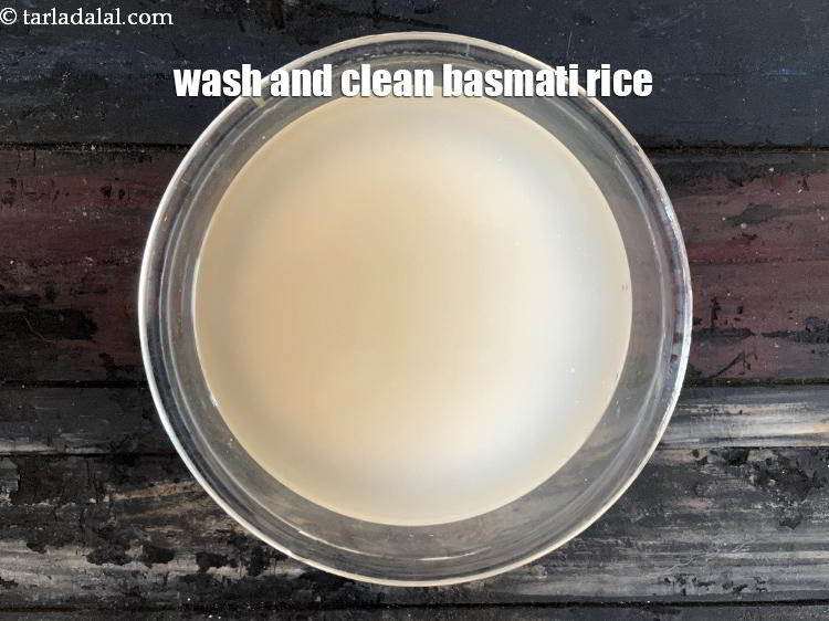 Step 9 – Wash and clean the rice in water.