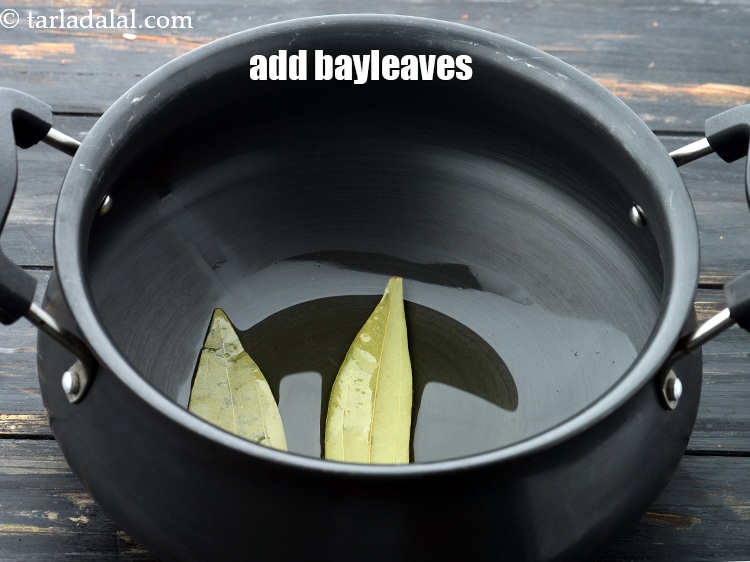 Step 9 – Add 2&nbsp;<a href="https://www.tarladalal.com/glossary-bay-leaf-tejpatta-bay-leaves-189i">bay leaves (tejpatta)</a>.&nbsp;