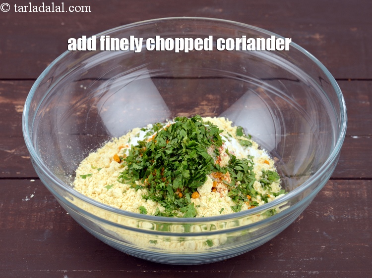 Step 9 – Add 2 tbsp finely <a href="https://www.tarladalal.com/glossary-chopped-coriander-783i">chopped coriander (dhania)</a>.