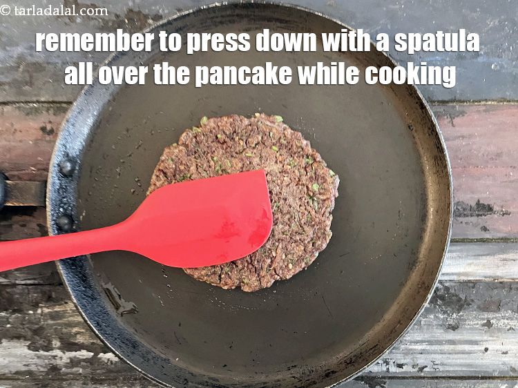Step 21 – Remember to press down with a spatula all over the pancake while cooking. This ensure …