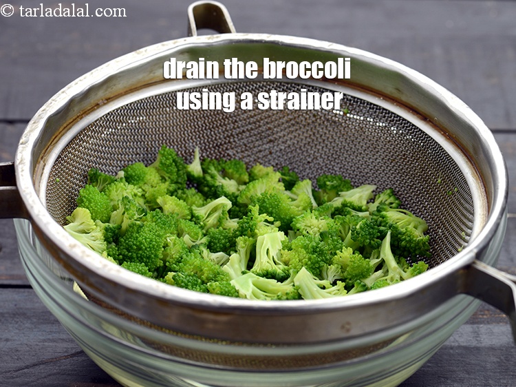 Step 8 – Drain the broccoli using a strainer. Discard the water.