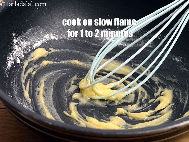 Step 11 – Cook on a slow flame for 1 to 2 minutes, while stirring continuously.