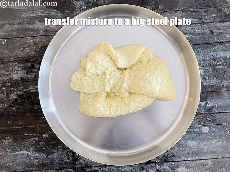 Step 9 – <meta charset="UTF-8" />Transfer the mava mixture into a large plate.&nbsp;