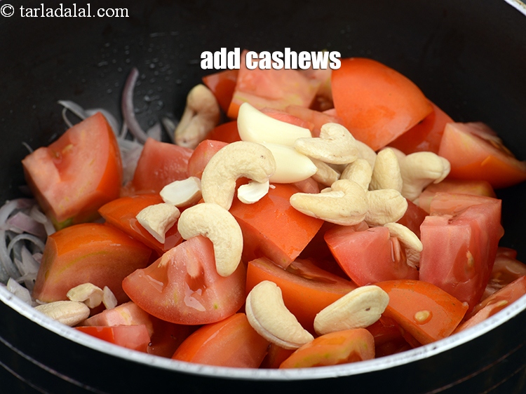 Step 9 – Add 2 tbsp of <a href="https://www.tarladalal.com/glossary-cashew-nuts-kaju-840i">cashew nuts (kaju)</a>.