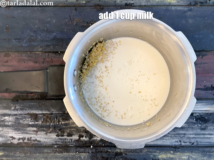 Step 13 – <meta charset="UTF-8" />Add 1 cup&nbsp;<a href="glossary-milk-doodh-full-fat-milk-buffalo-milk-full-cream-milk-514i">milk</a>.