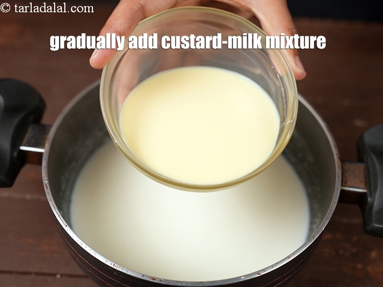 Step 8 – Gradually add custard-milk mixture, while stirring continuously so that no lumps remain.